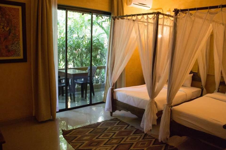 Devarya Wellness Beach Resort Morjim Luaran gambar